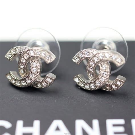 white gold chanel cc earrings|chanel z3502 earrings.